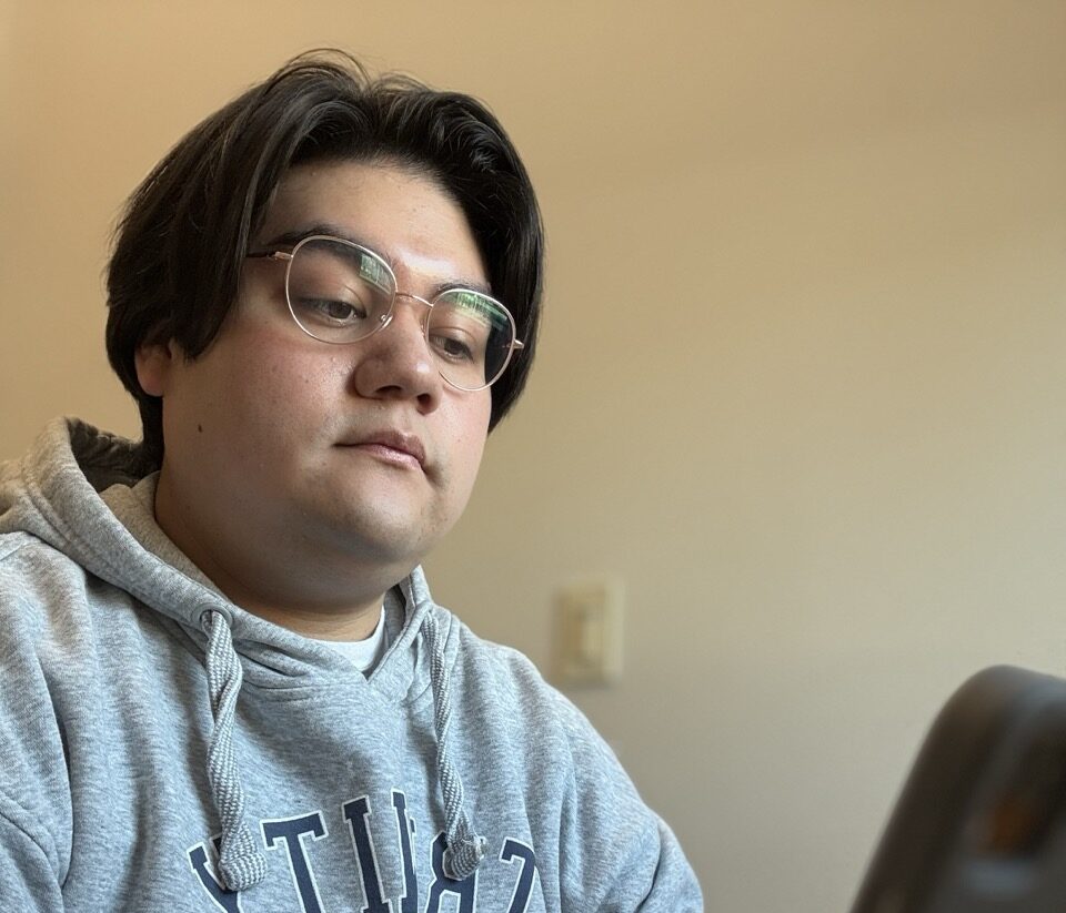 Photo of Man at Computer